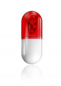 capsule with a skull on it