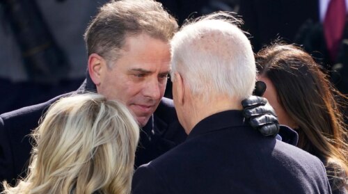 Photo of Hunter Biden, Jill Biden, and Joe Biden hugging.